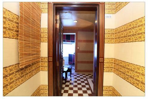 Apartamento Roomi Suites Hotel