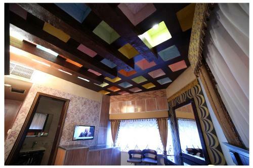 Apartamento Roomi Suites Hotel