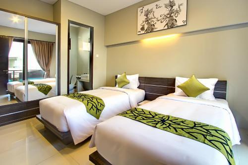 Hotel Denbukit Residence And Suite
