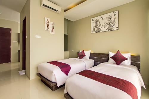 Hotel Denbukit Residence And Suite