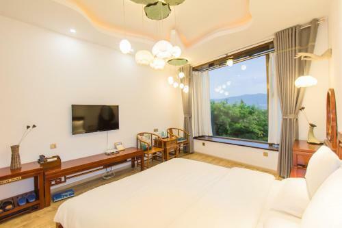 Posada Jue Se Garden Theme Inn
