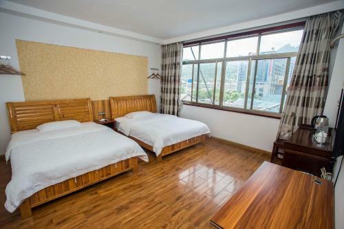 Posada Zhangjiajie Yijiaqin Hotel