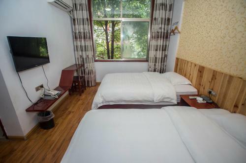Posada Zhangjiajie Yijiaqin Hotel