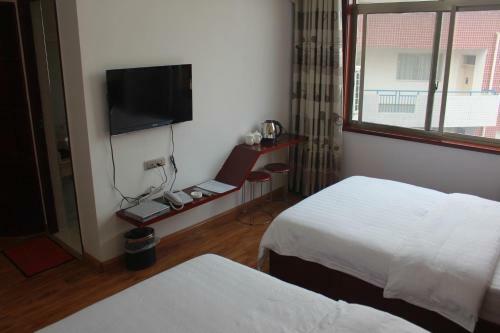 Posada Zhangjiajie Yijiaqin Hotel