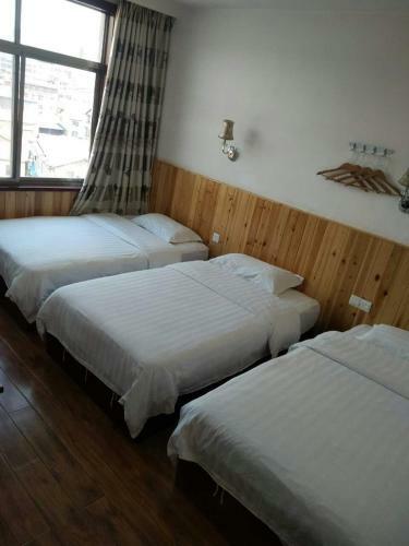 Posada Zhangjiajie Yijiaqin Hotel