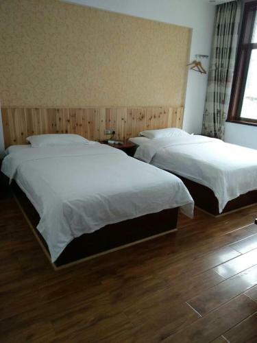 Posada Zhangjiajie Yijiaqin Hotel