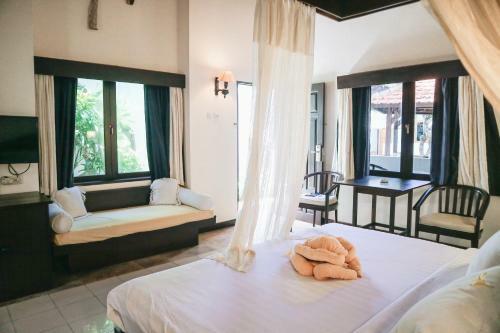 Hotel Kuta Lagoon Resort And Pool Villas