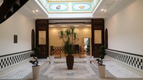 Hotel Heeren Palm Suites