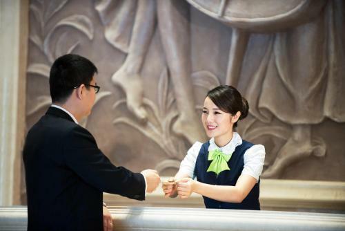 Vienna Hotel Songjiang Xin Qiao