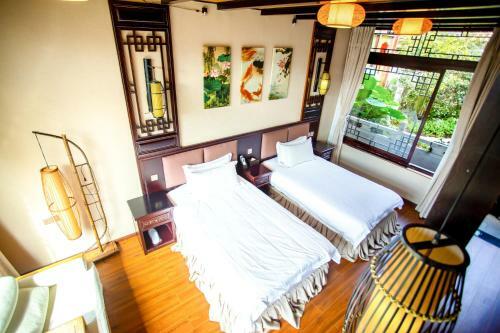 Posada Tenchong Heshun Qishe Inn