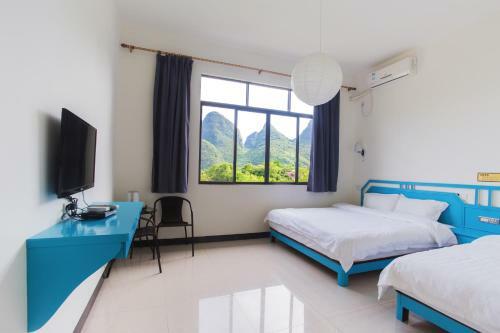 Bed & Breakfast Dragon's Den Hostel In Yangshuo