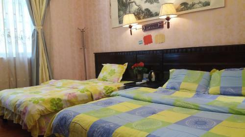 Hostal Yangshuo Baijiale Theme Inn
