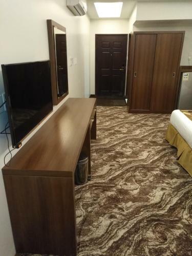 Apartamento Crown Glory Hotel Suites