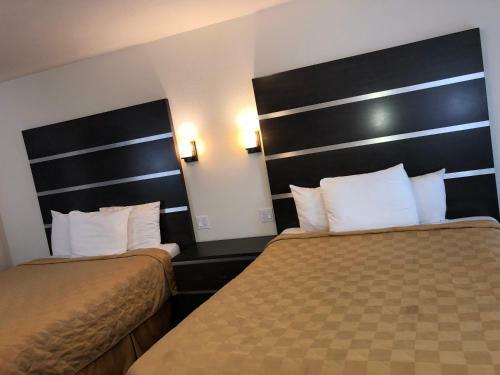 Motel Cedar Inn & Suites