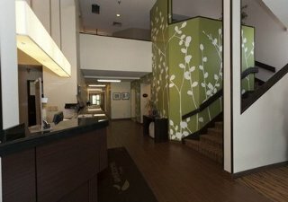 Motel Sleep Inn & Suites Airport