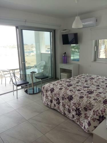 Apartamento Christopher's Sandy Beach Suites