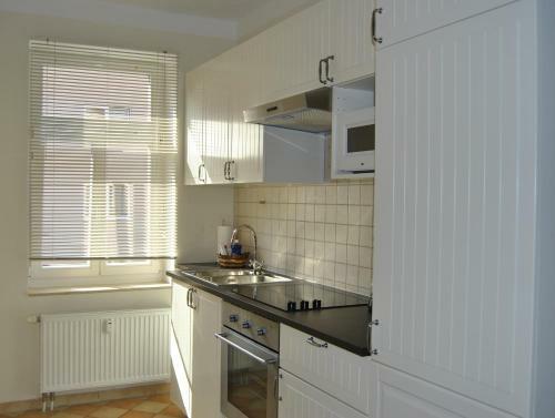 Adoreo Apartments & Suites
