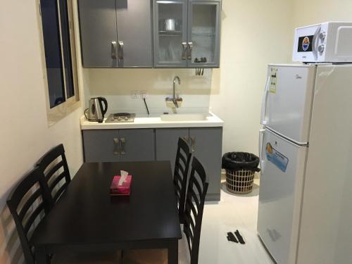 Beet Al Malqa Furnished Apartments