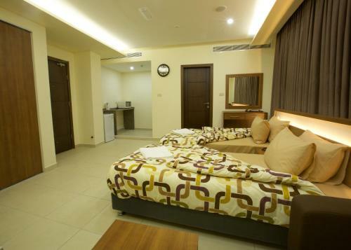 Apartamento Lujain Hotel Suites