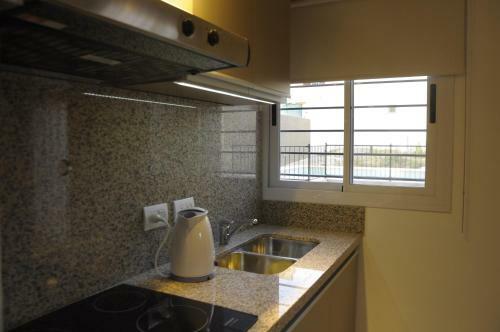 Apartamento Lom Suites
