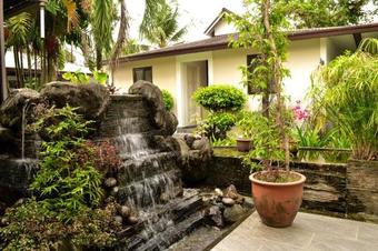 Hostal Qi Hotel And Club