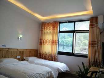 Hotel Zhang Jiajie Longquan Inn