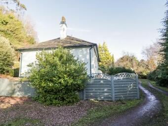 The Blue House At Magnolia Lake
