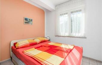 Four-bedroom Holiday Home In Lovran