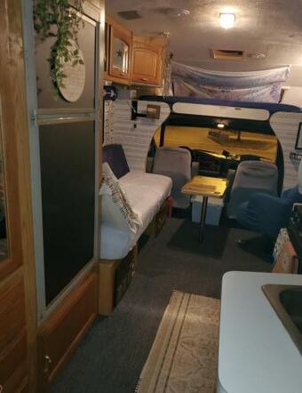 Rv With 3 Beds Plus Set Up Tent With One Bed Close To Everything